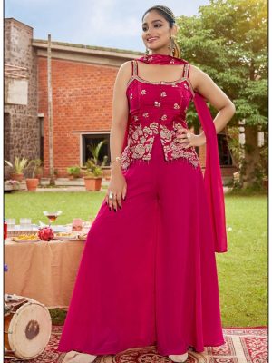 Fuchsia Palazzo set with trending sleeveless short top , flowy skirt like pants and a matching choker dupatta. Perfect for weddings and festive occasions .