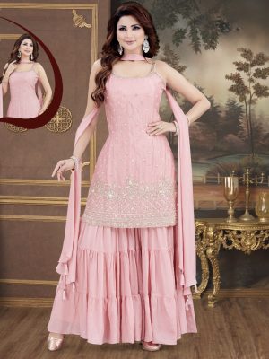 Elegant blush pink sharara set featuring delicate gold embroidery on the kurta, paired with a flowy tiered sharara and a matching dupatta(stole). Graceful, Feminine and perfect for festive celebrations and special occasions